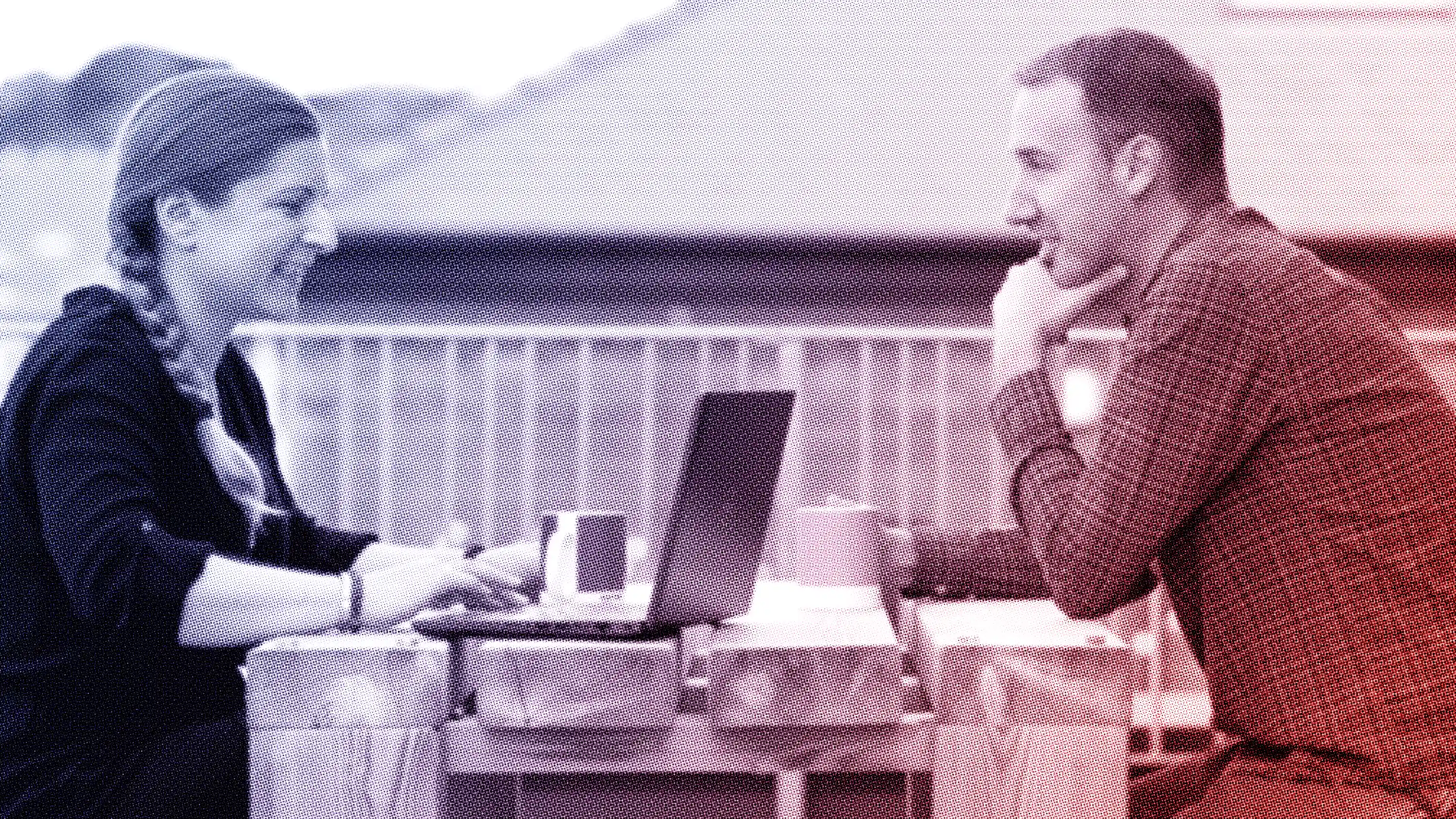 2 people talking at outside table