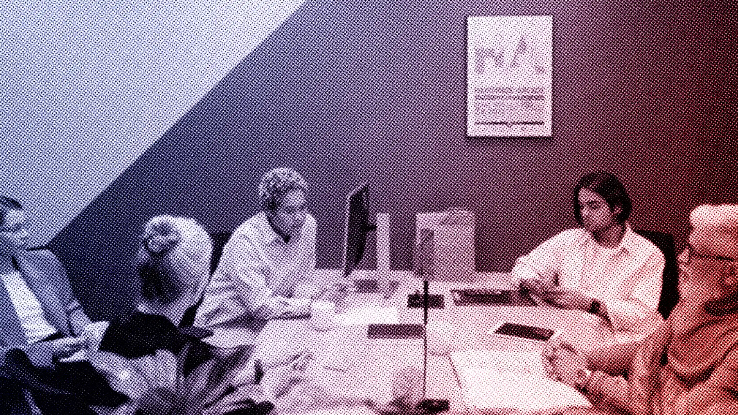 group of people talking around table